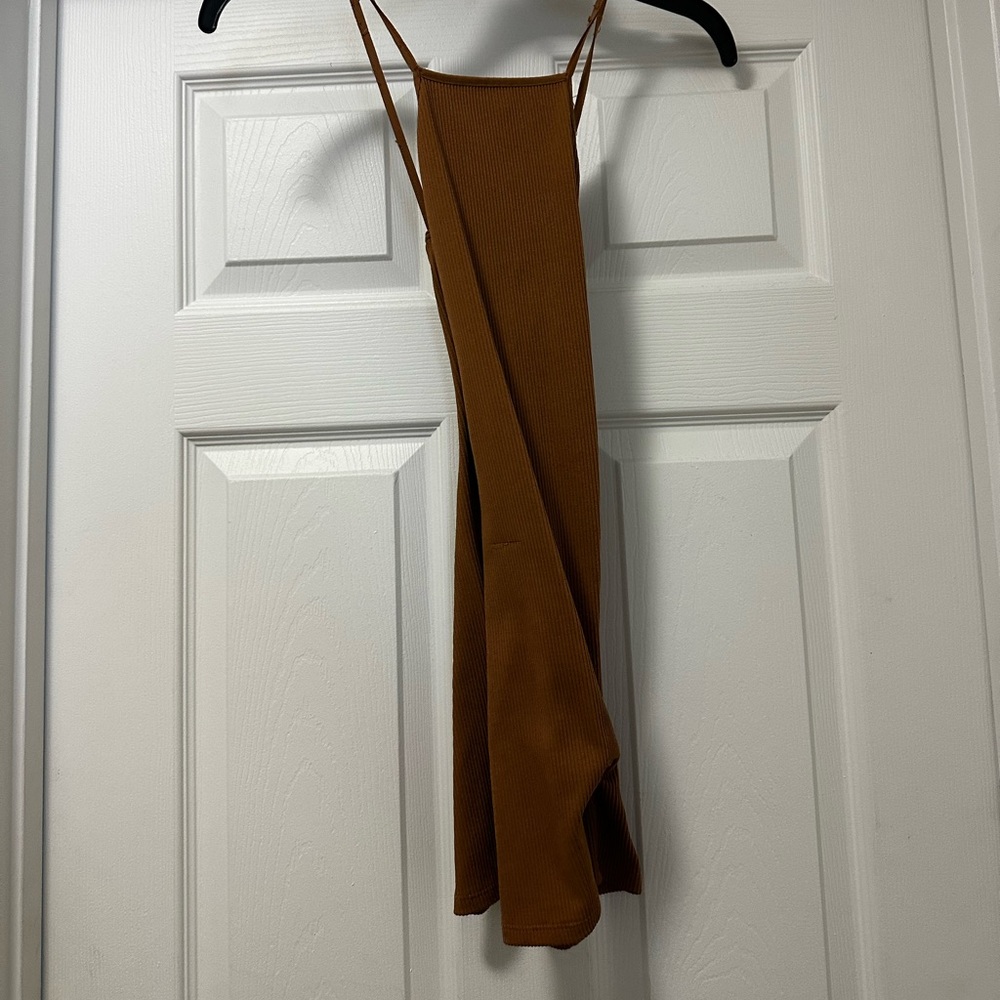 Criss cross body suit